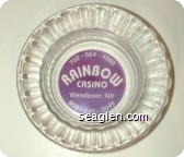 702-664-4000, Rainbow Casino, Wendover, NV, 800-217-0049 - Clear through violet imprint Glass Ashtray