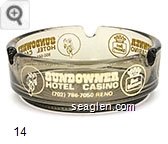 Sundowner Hotel Casino, (702) 786-7050 Reno, 800-528-1234 Reno, 800-648-5490 Reno - Yellow imprint Glass Ashtray